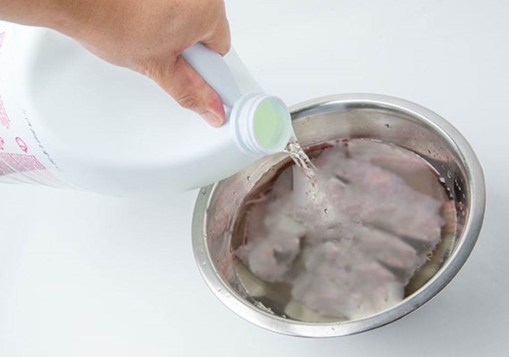 How do you clean and disinfect a dog bowl?